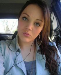 Busty chick spreading legs